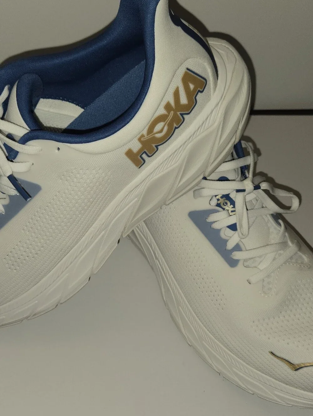 Hoka One One White and Navy Athletic Running Shoes with Gold Logo